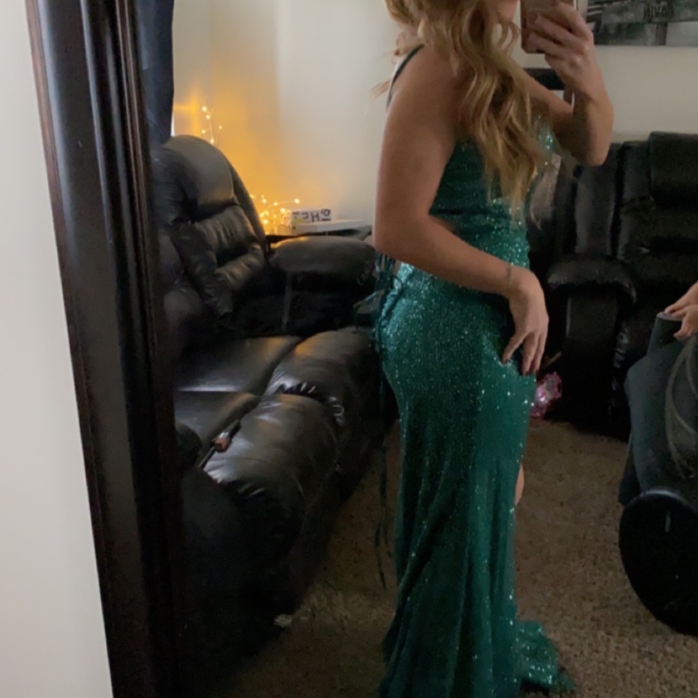 Gorgeous prom or a ball dress. Sequence, split in the front open back.
